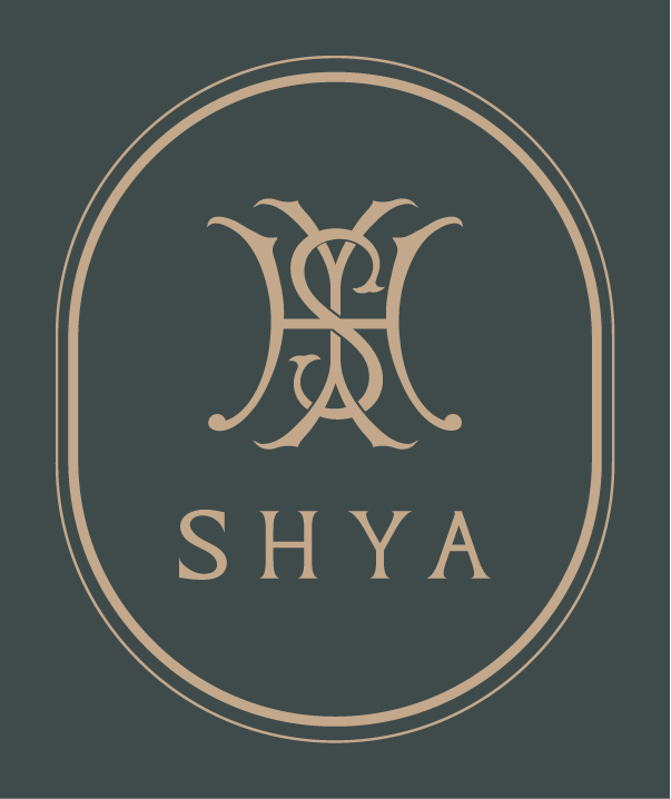 shya logo primary beige on green